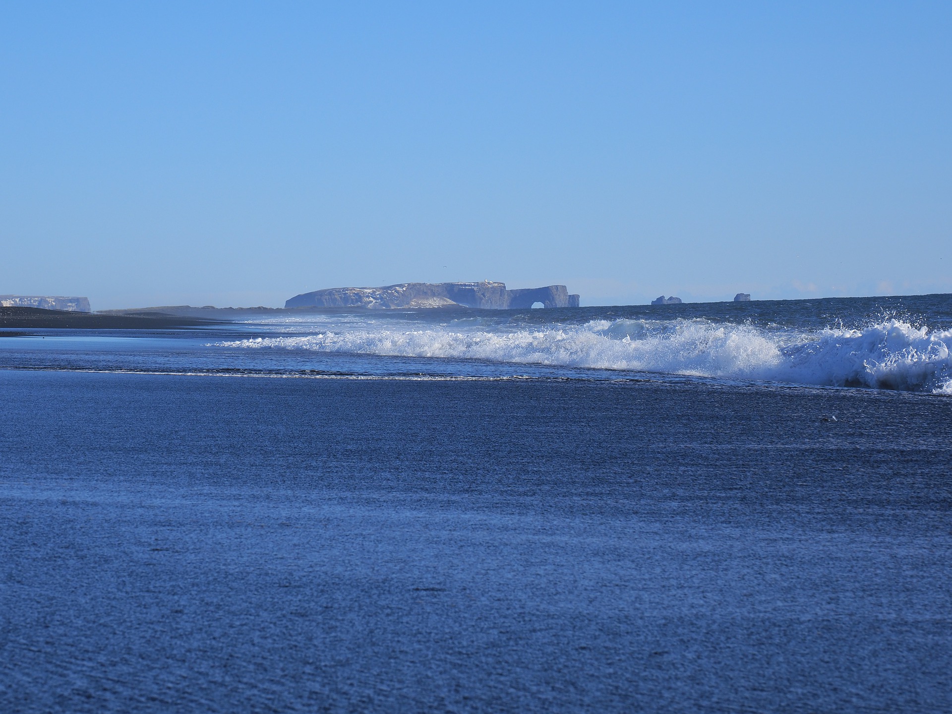 Dyrhoaley viewed from Solheimasandur Black Sand Beach in Iceland